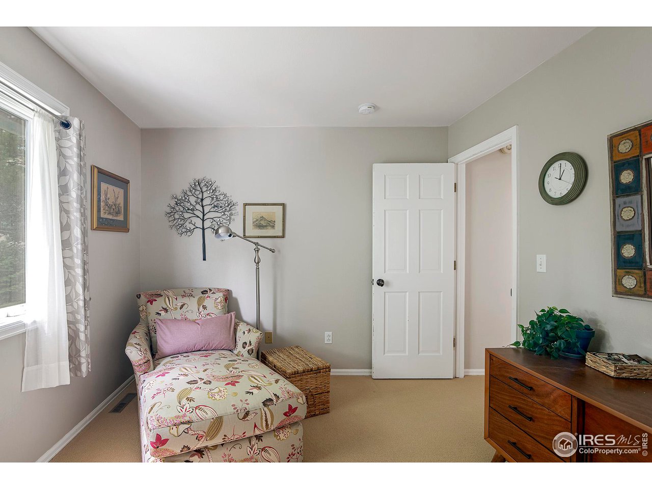 476 Locust Place Boulder, CO 80304 - Photo 26 of 38 a bedroom with a bed and a window