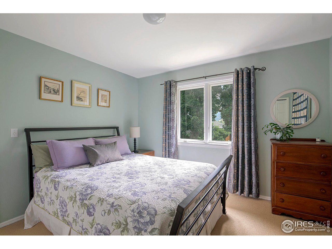 476 Locust Place Boulder, CO 80304 - Photo 27 of 38 a bedroom with a bed and a dresser