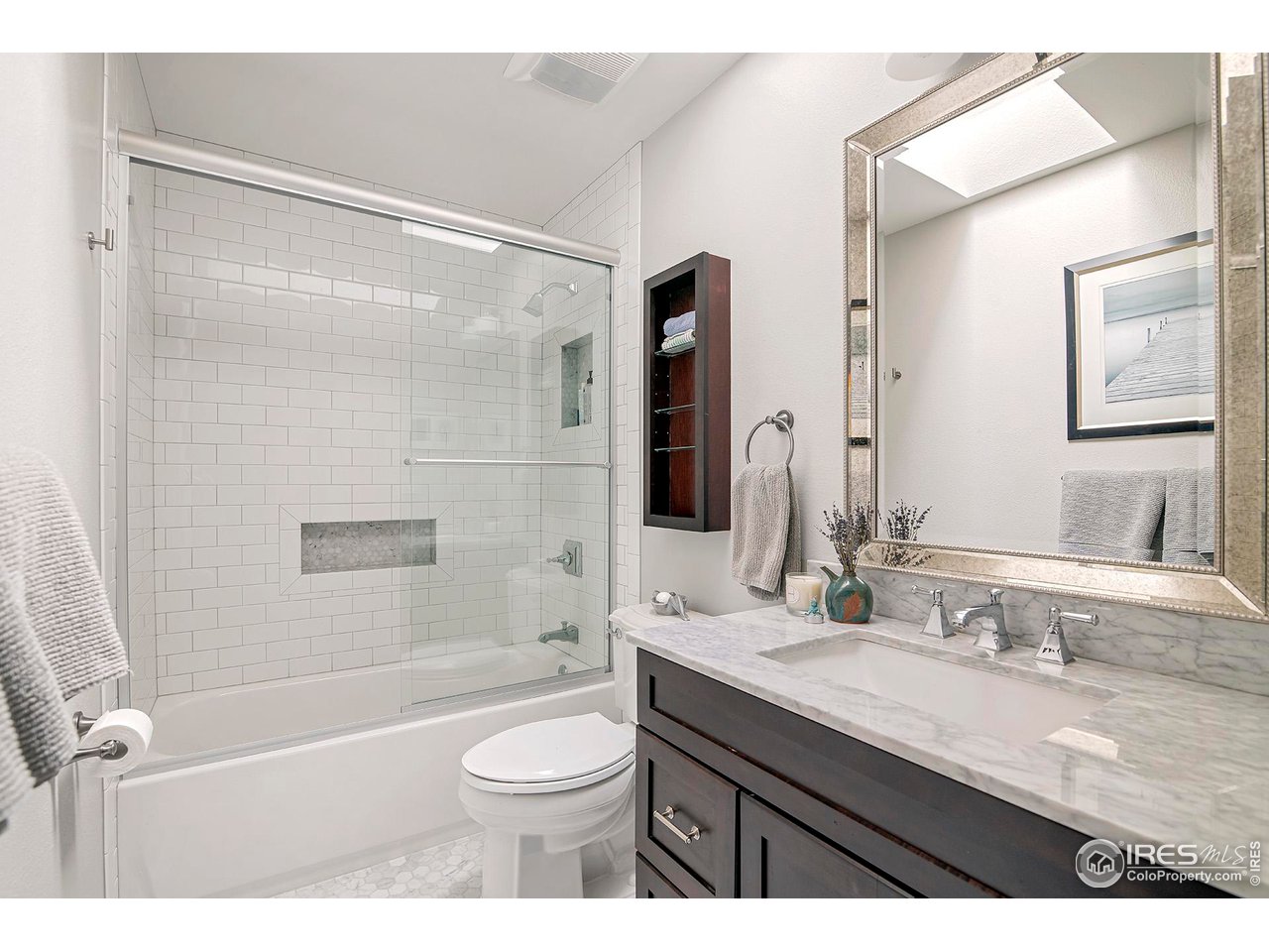 476 Locust Place Boulder, CO 80304 - Photo 28 of 38 a bathroom with a granite countertop sink toilet and shower