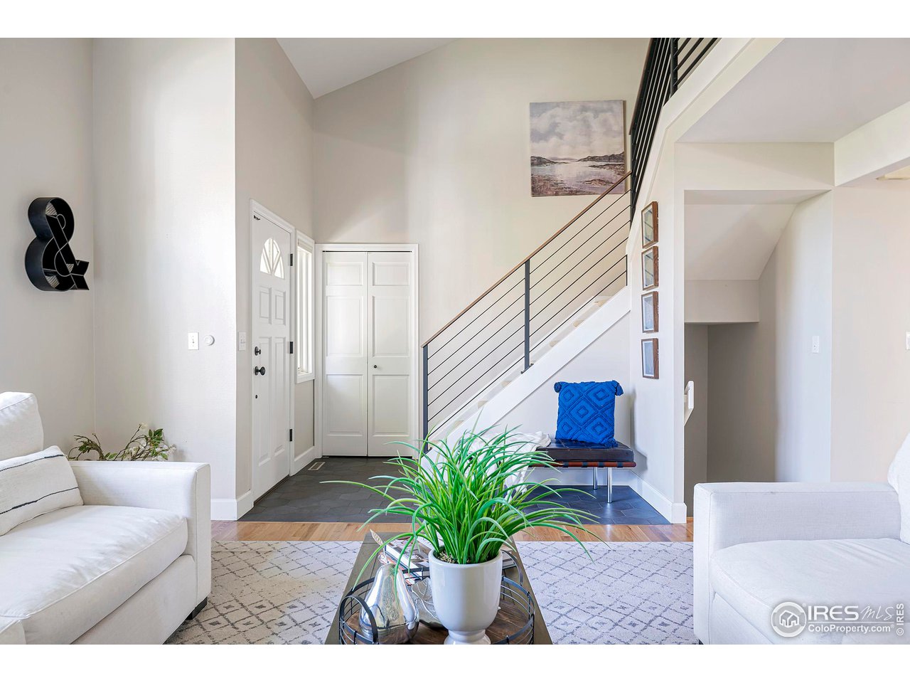 476 Locust Place Boulder, CO 80304 - Photo 3 of 38 a view of entryway and hall with wooden floor