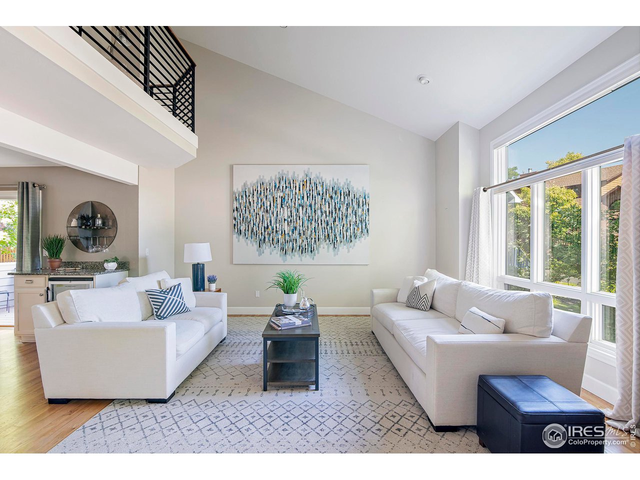 476 Locust Place Boulder, CO 80304 - Photo 4 of 38 a living room with furniture and a large window