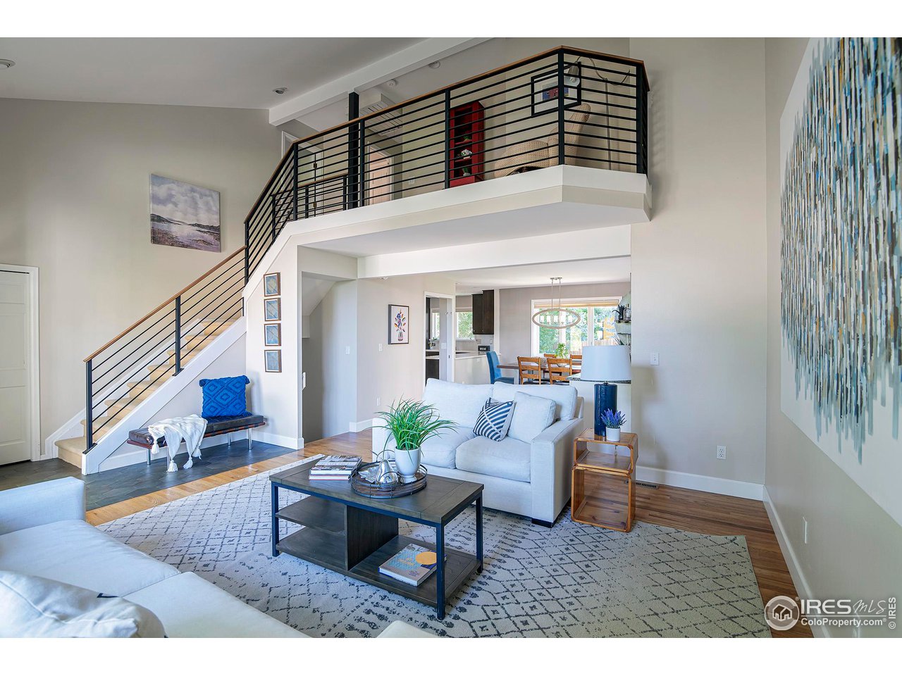 476 Locust Place Boulder, CO 80304 - Photo 5 of 38 a living room with furniture and a potted plant