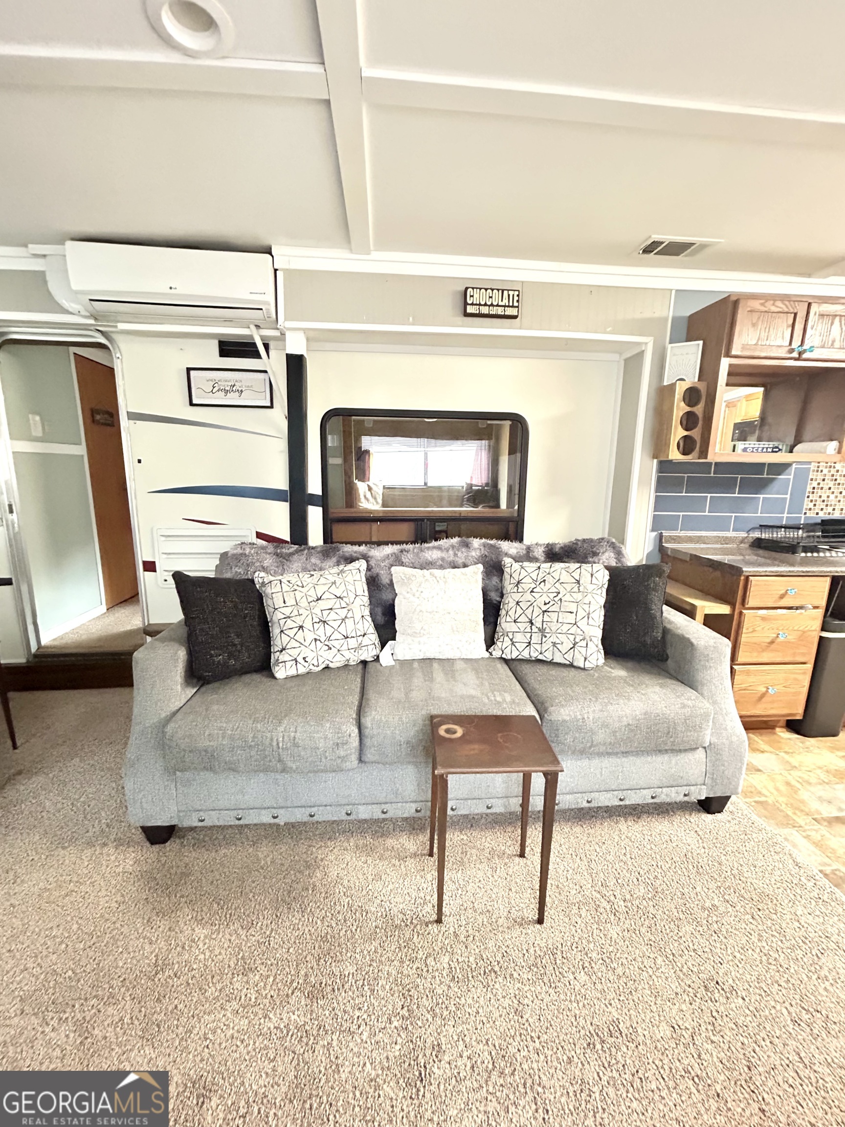 6 Grove Lane Cleveland, GA 30528 - Photo 19 of 40 a living room with furniture and a couch