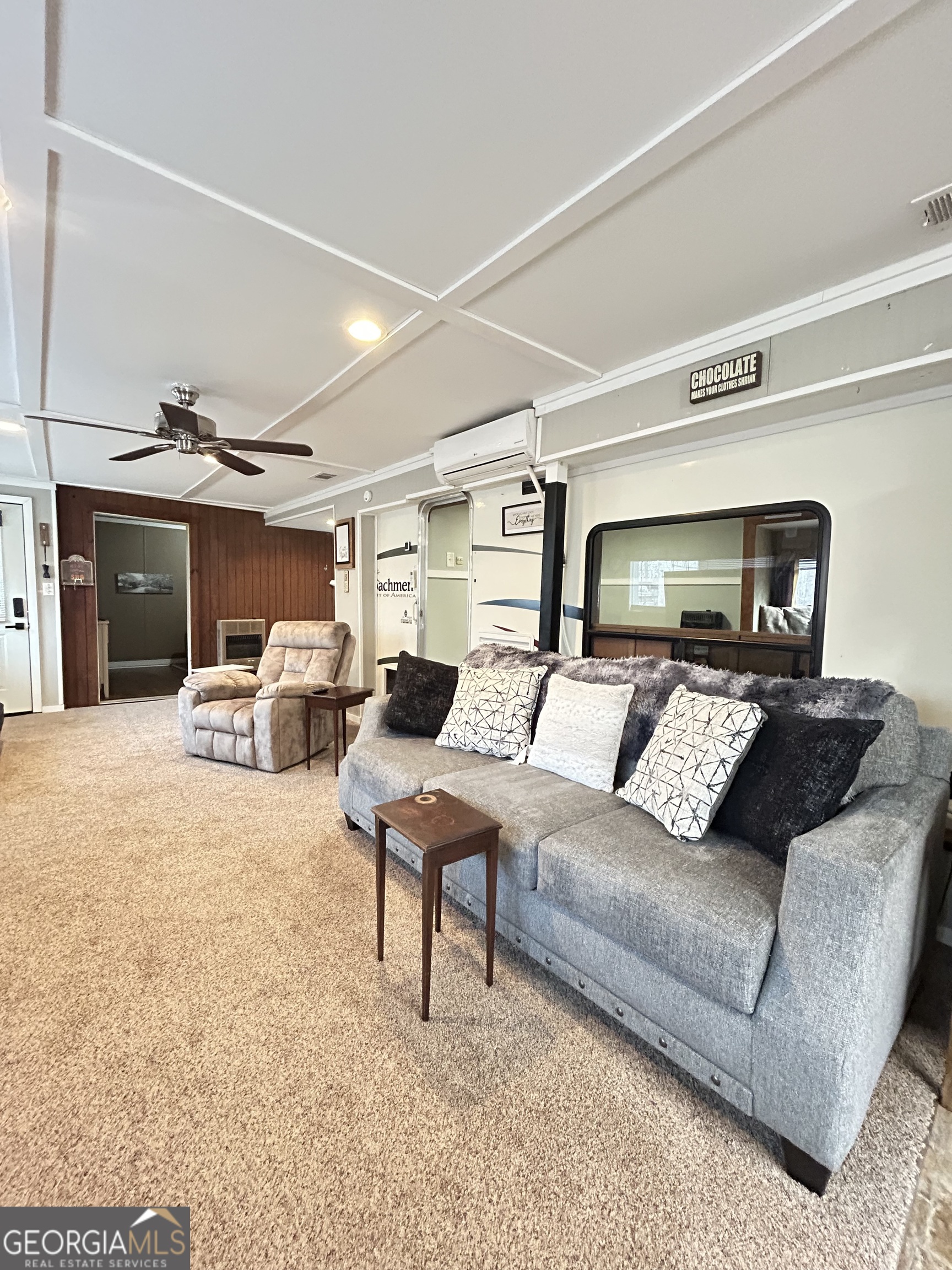 6 Grove Lane Cleveland, GA 30528 - Photo 20 of 40 a living room with furniture and a chandelier