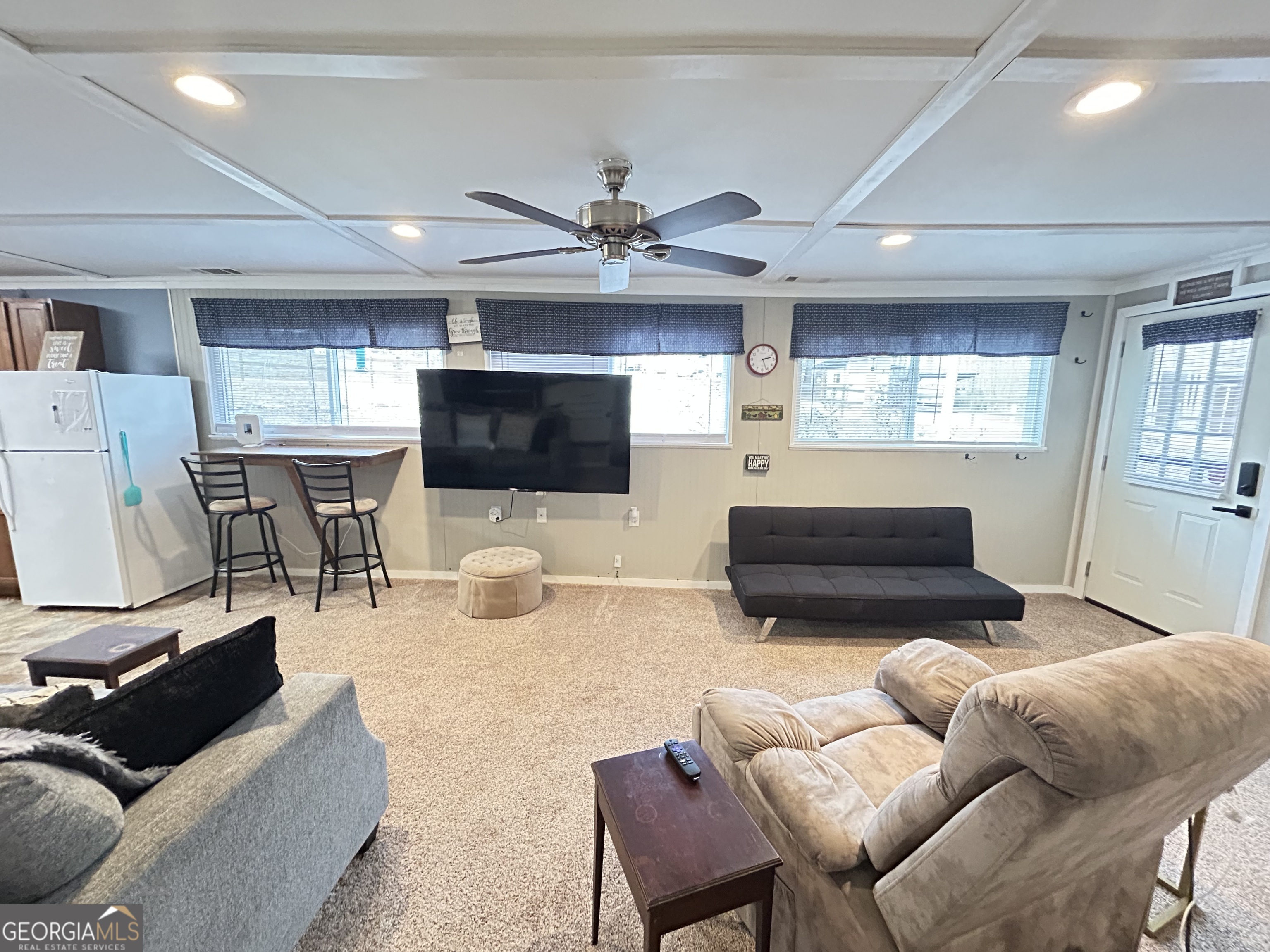 6 Grove Lane Cleveland, GA 30528 - Photo 21 of 40 a living room with furniture and a flat screen tv