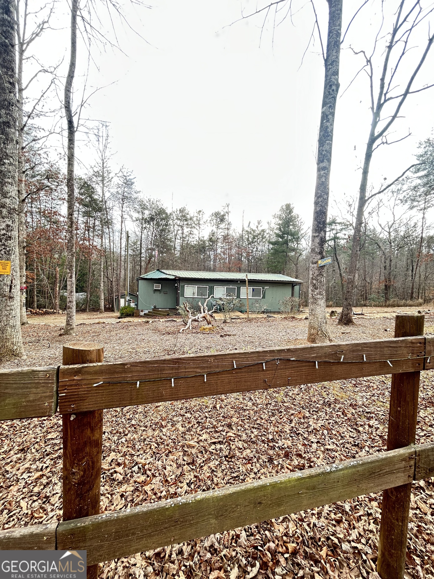6 Grove Lane Cleveland, GA 30528 - Photo 3 of 40 a view of swimming pool with a yard and sitting area