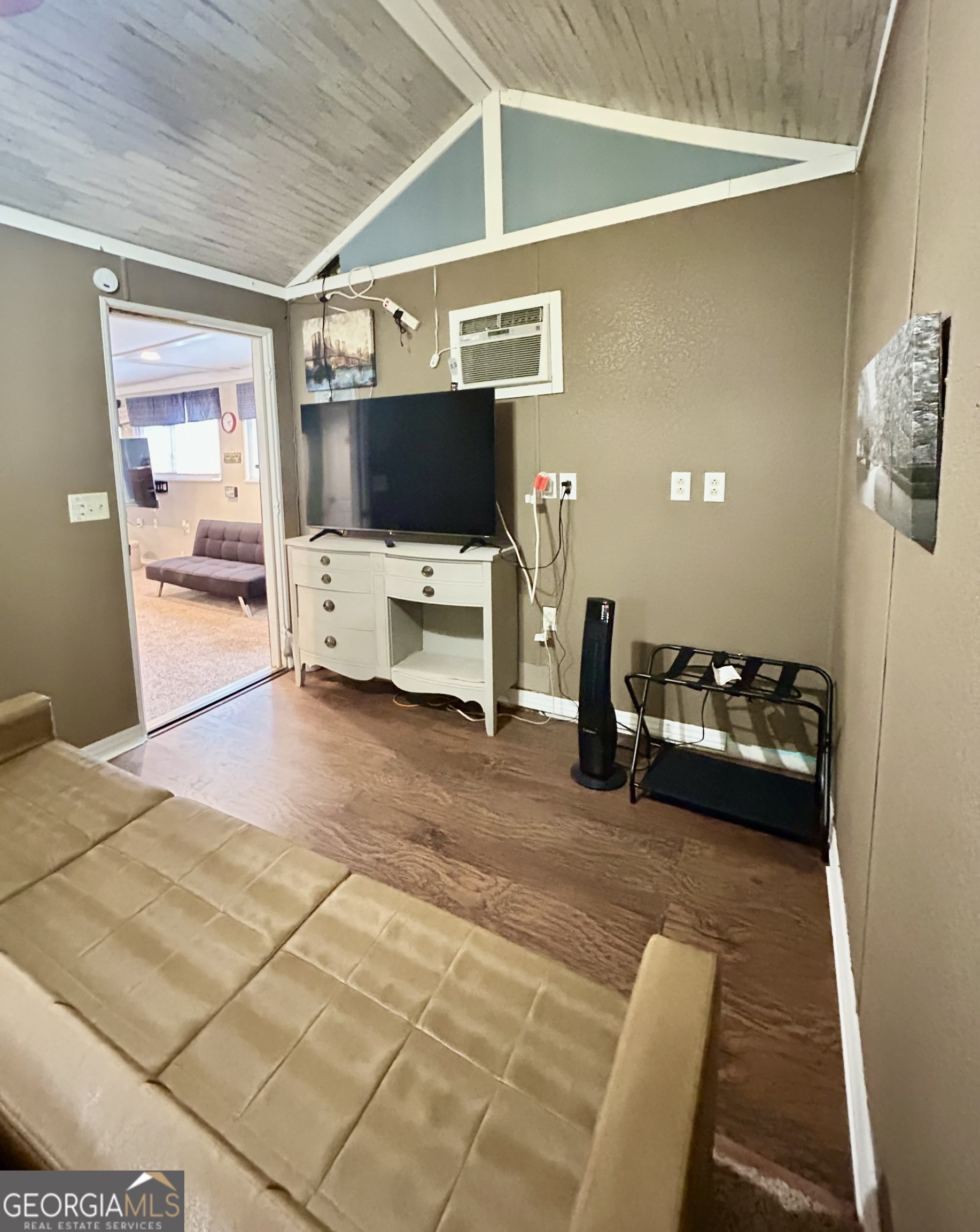 6 Grove Lane Cleveland, GA 30528 - Photo 33 of 40 a living room with furniture and a flat screen tv
