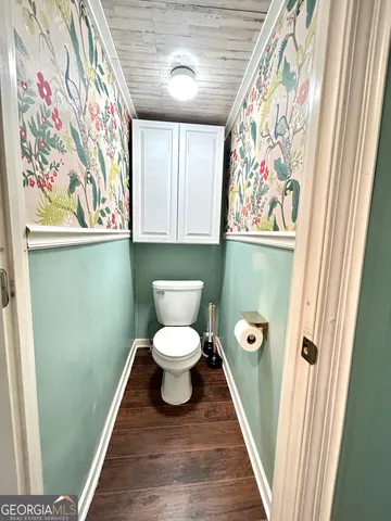 a view of a house with a snow on the ground