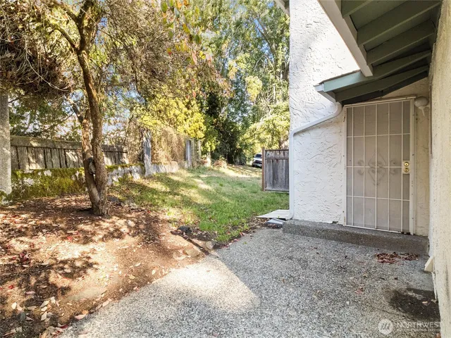 a view of backyard with green space