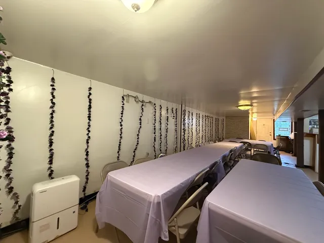 a view of a livingroom with furniture and window