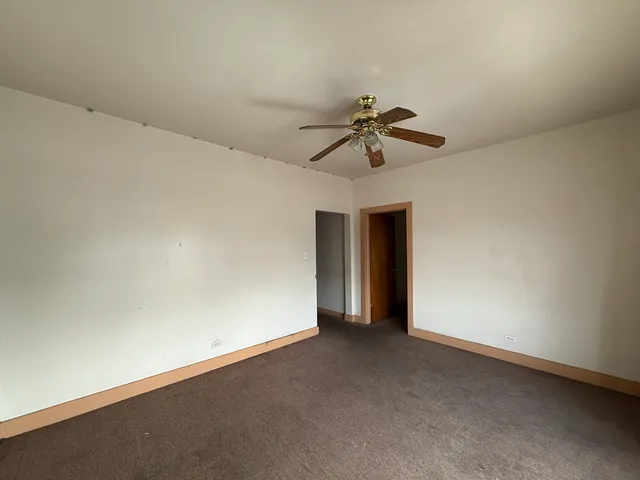 a view of a big room with carpet