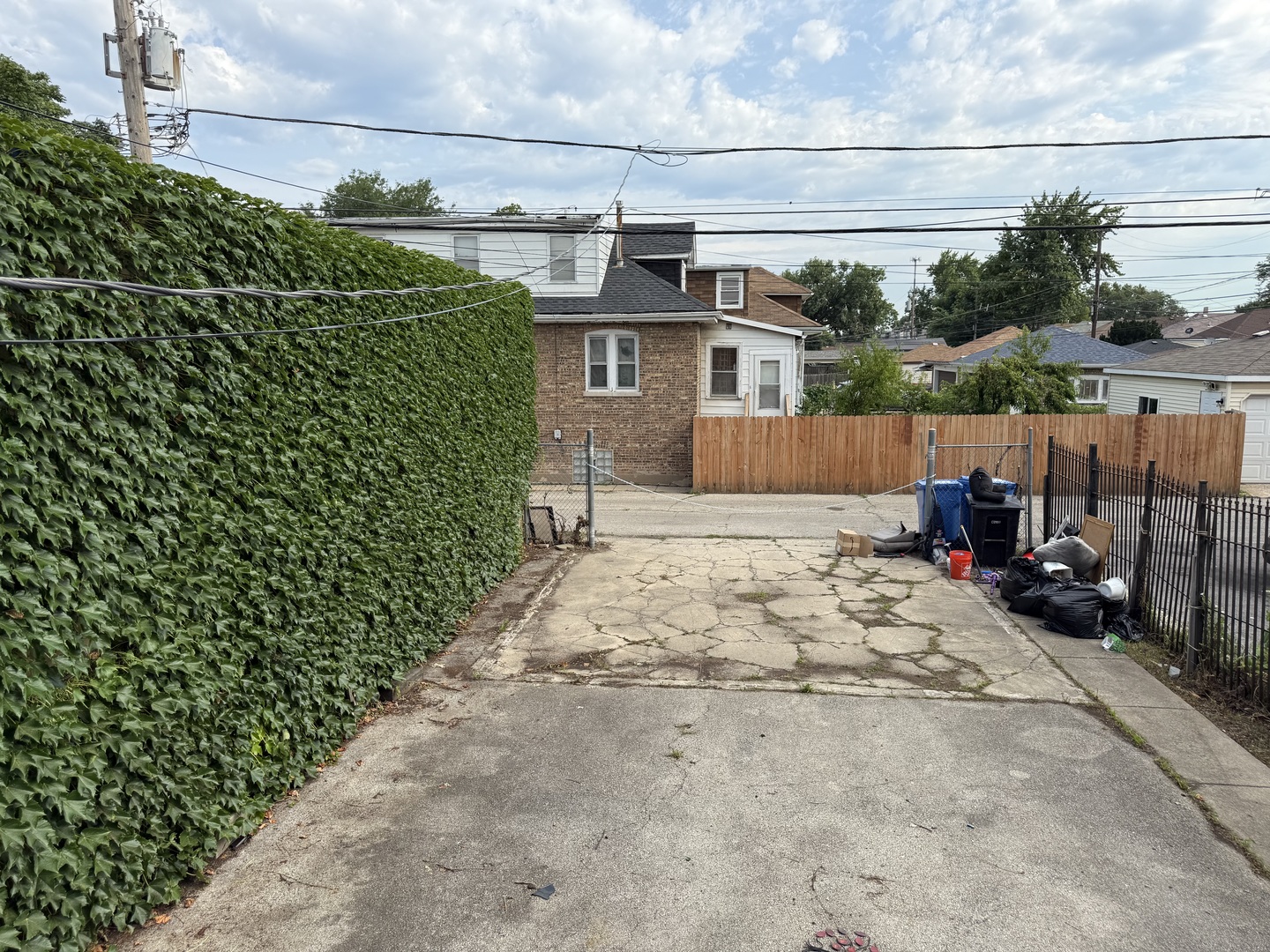 5818 West North Avenue Chicago, IL 60639 - Photo 34 of 37 a front view of a house with a yard