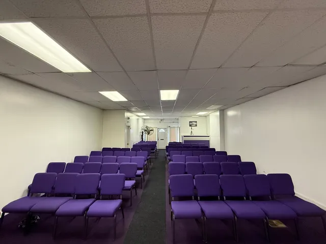 a large couch sitting in a room next to a couch