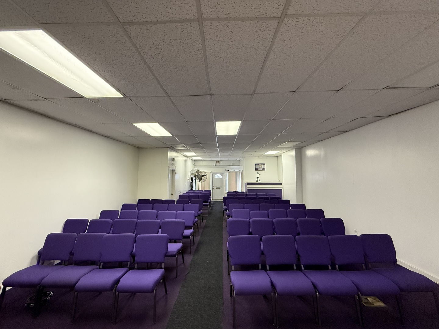 5818 West North Avenue Chicago, IL 60639 - Photo 8 of 37 a large couch sitting in a room next to a couch