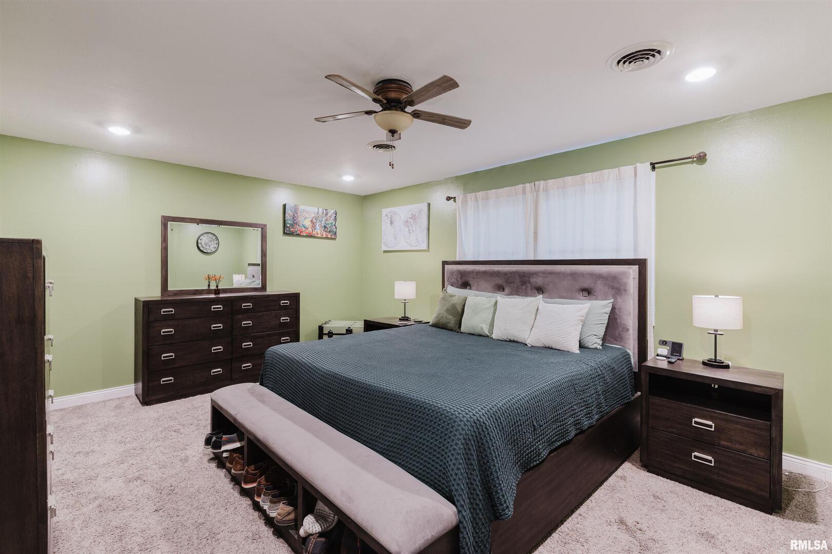 1821 South 27th Street Herrin, IL 62948 - Photo 13 of 35 a bedroom with a bed and a dresser