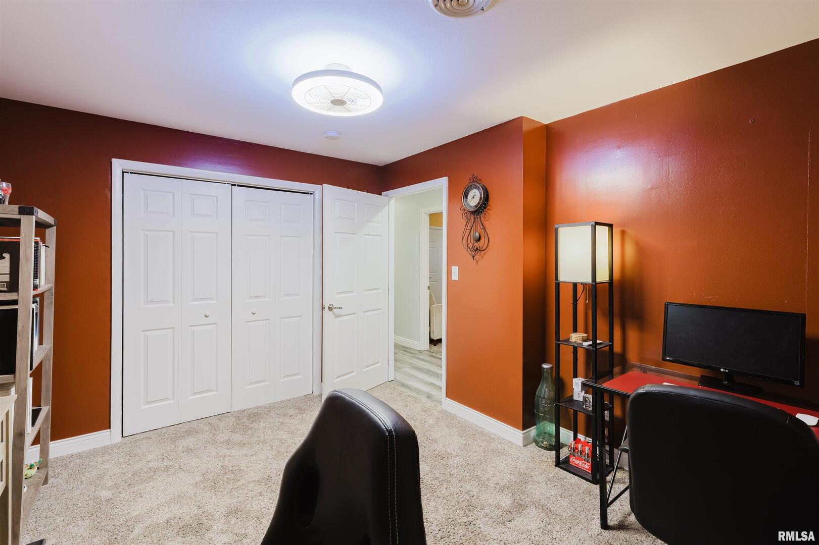 1821 South 27th Street Herrin, IL 62948 - Photo 20 of 35 a bedroom with bed and mirror