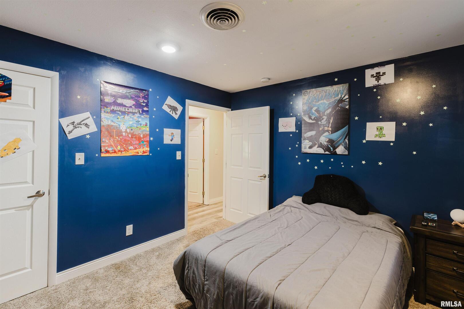 1821 South 27th Street Herrin, IL 62948 - Photo 22 of 35 a bedroom with a bed and a large mirror