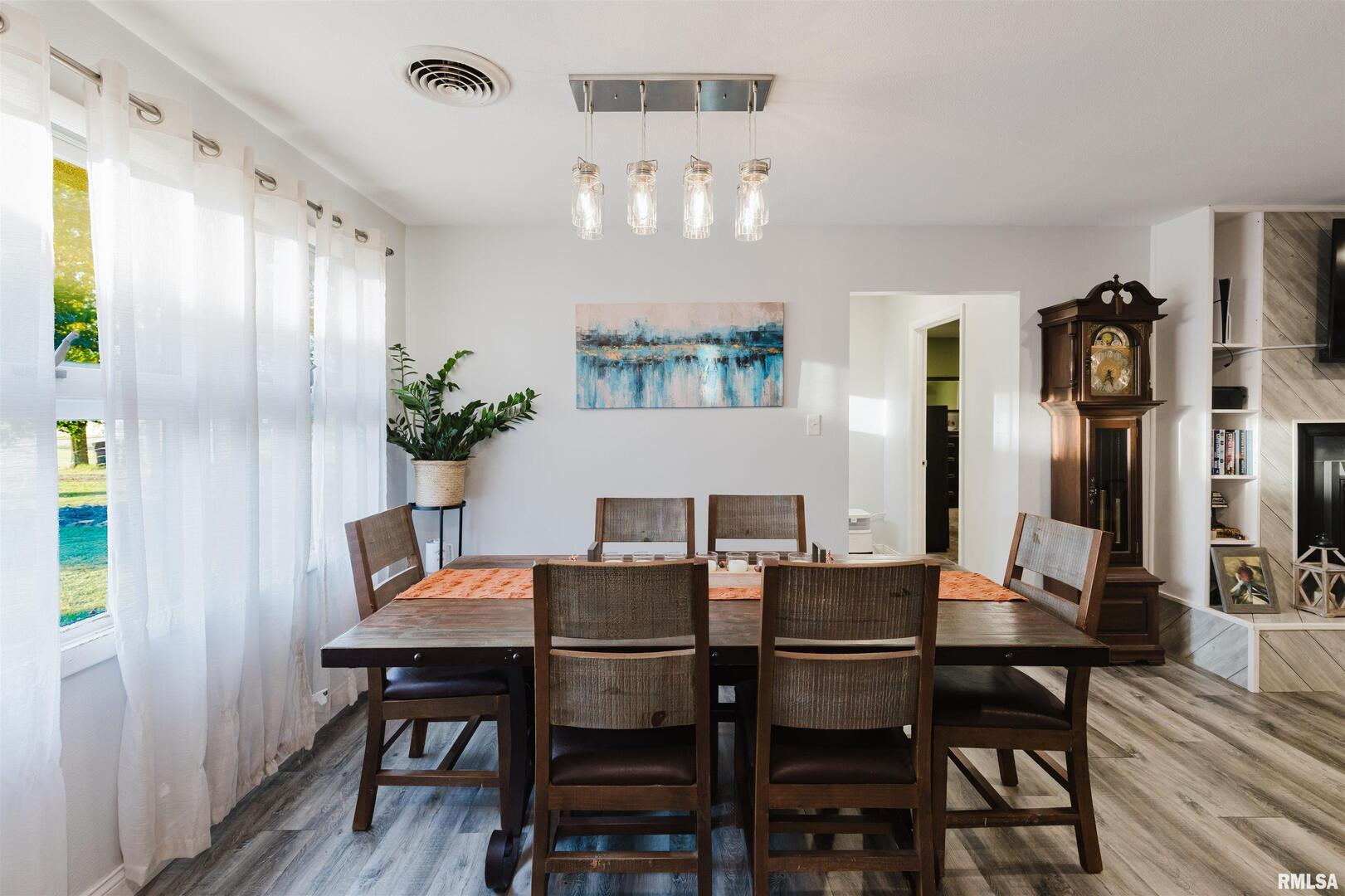 1821 South 27th Street Herrin, IL 62948 - Photo 10 of 35 a view of a dining room with furniture and chandelier