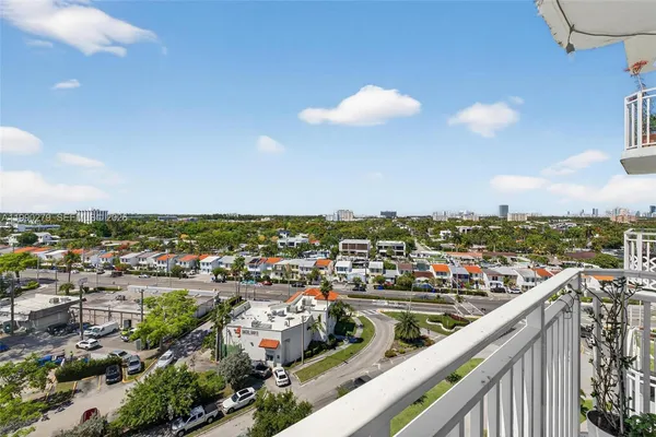 a view of a city skyline from a balcony