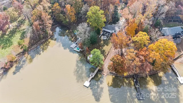a view of swimming pool with a yard