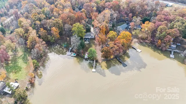 swimming pool view with a seating space