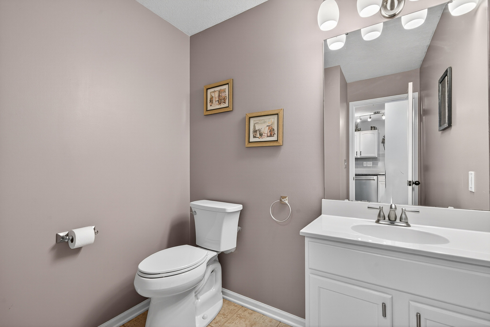 1152 Rose Drive Sycamore, IL 60178 - Photo 15 of 34 a bathroom with a toilet sink and mirror