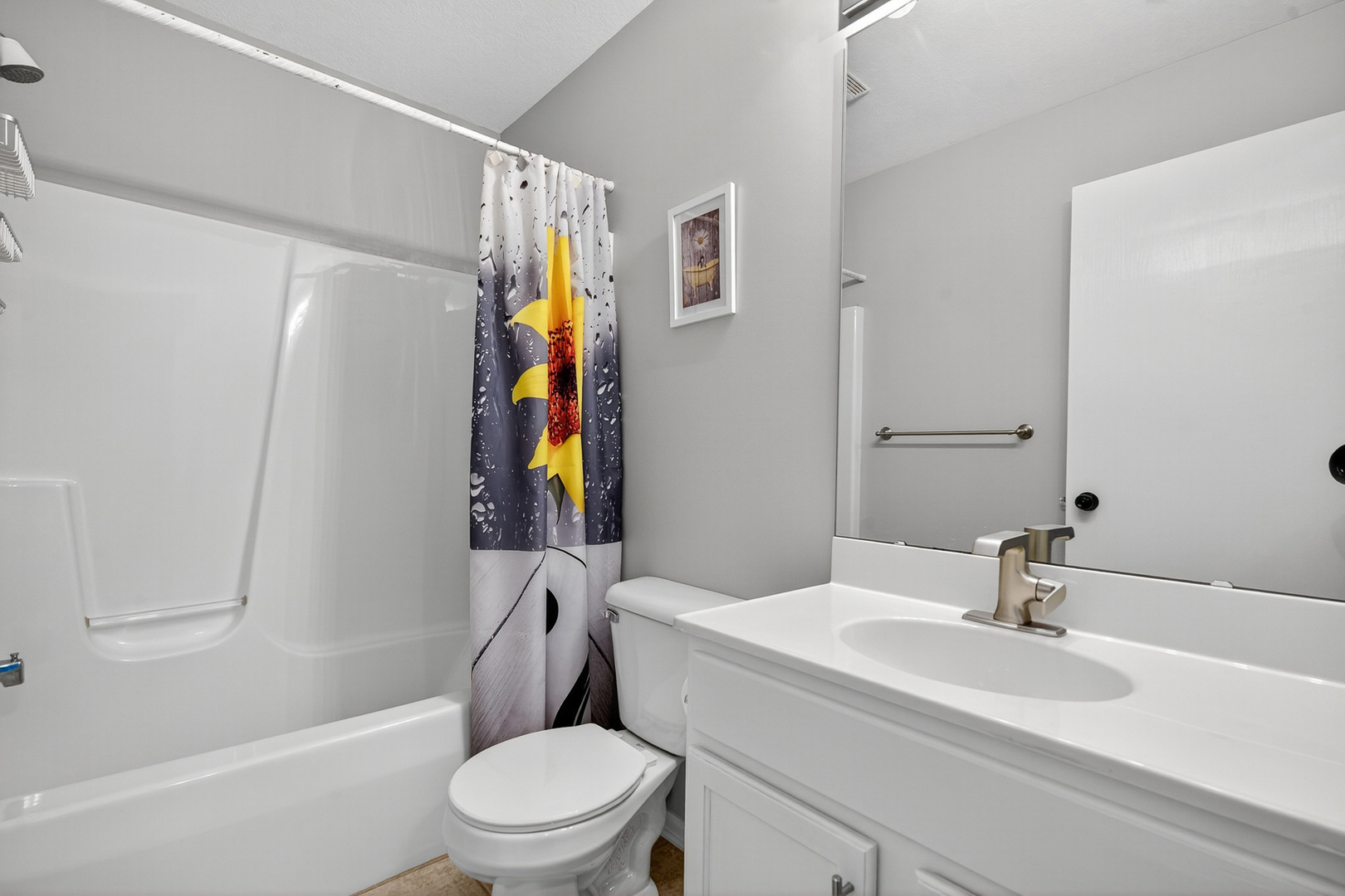 1152 Rose Drive Sycamore, IL 60178 - Photo 17 of 34 a bathroom with a sink toilet and shower