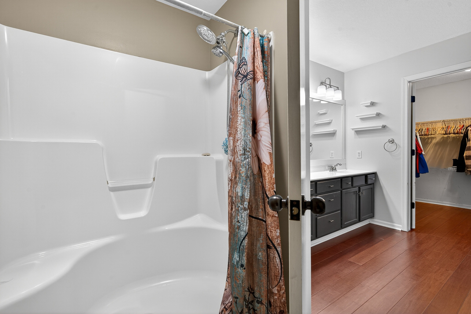 1152 Rose Drive Sycamore, IL 60178 - Photo 24 of 34 a bathroom with a bathtub and a shower