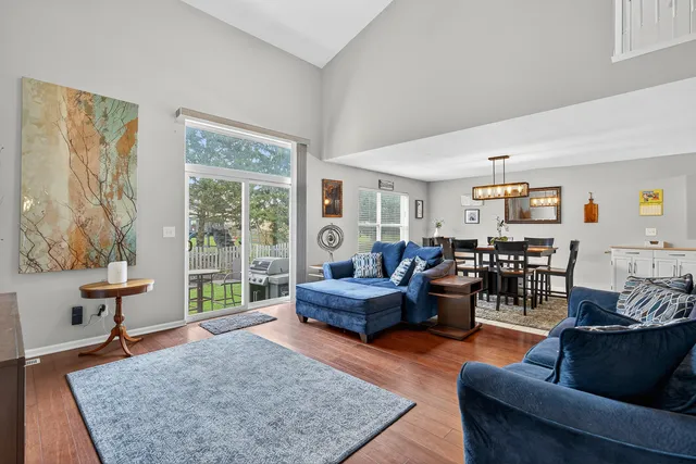 a living room with furniture and a rug