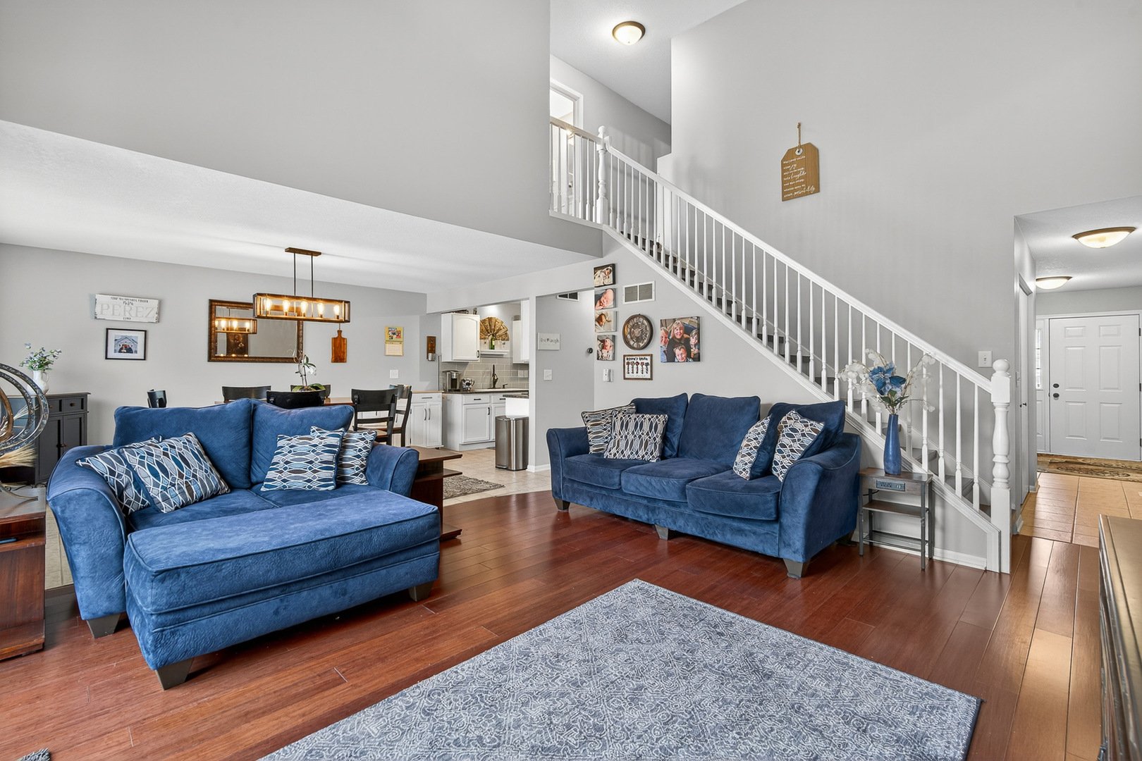 1152 Rose Drive Sycamore, IL 60178 - Photo 5 of 34 a living room with furniture and wooden floor