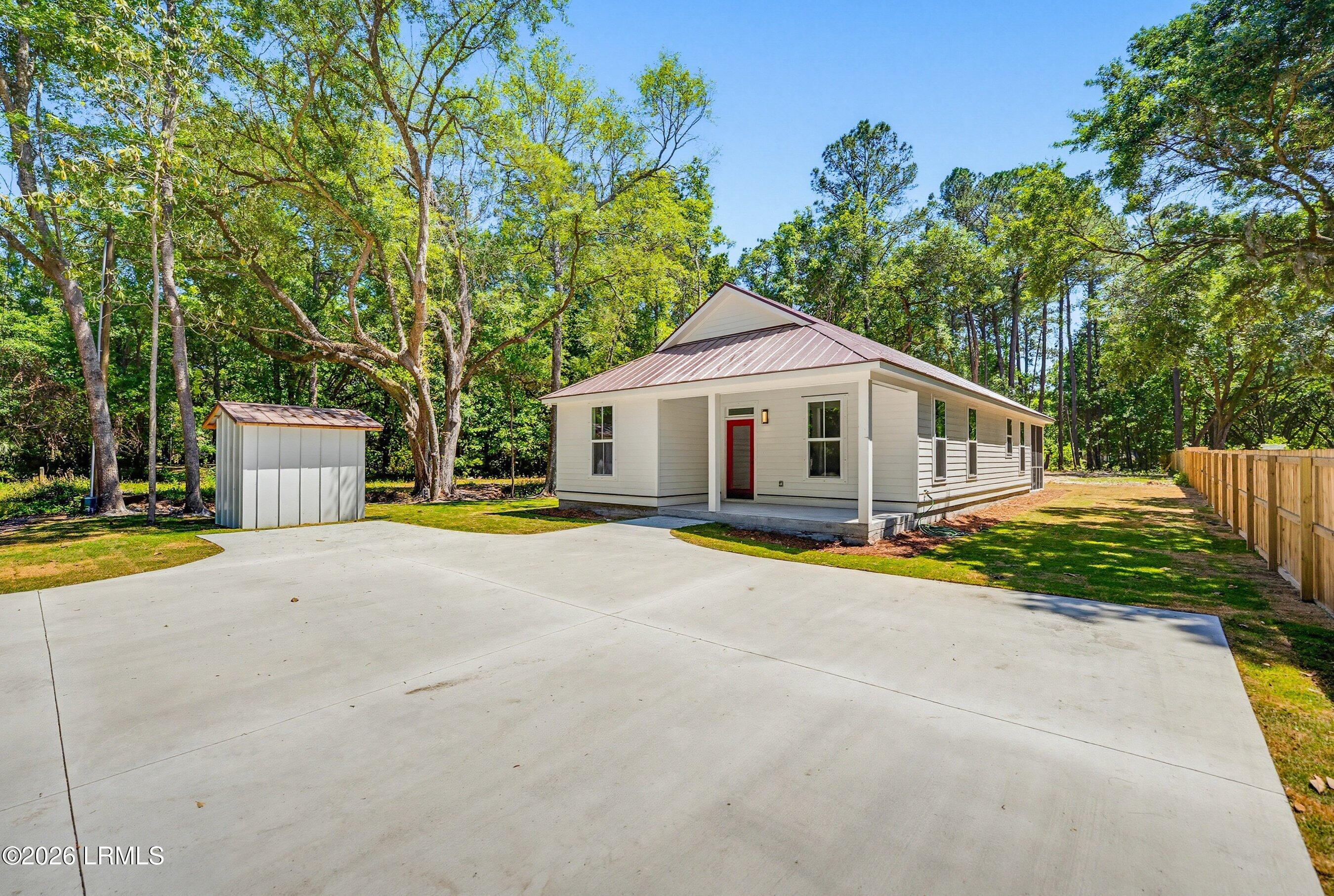 23 Seabrook Center Road Seabrook, SC 29940 - Photo 2 of 38 Front With Driveway