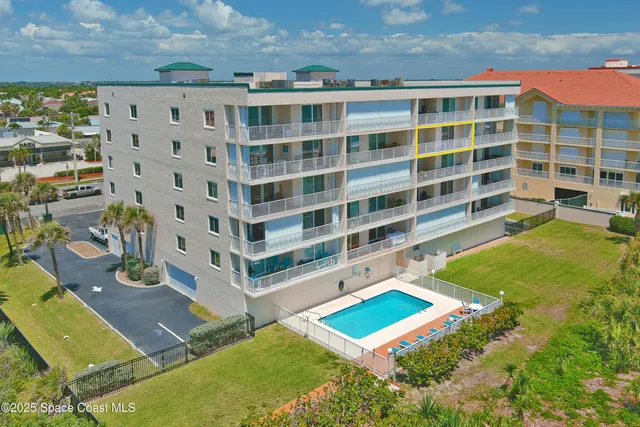 a view of a lake with a yard