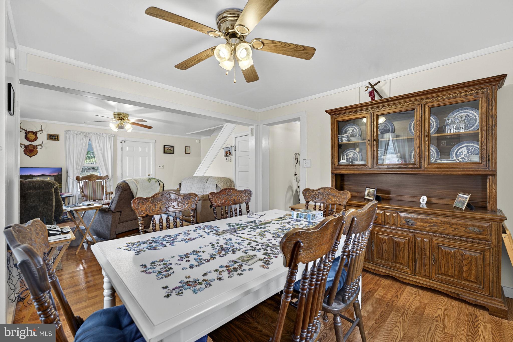 10500 Ford Hill Road Rio, WV 26755 - Photo 15 of 59 a view of a dining room with furniture
