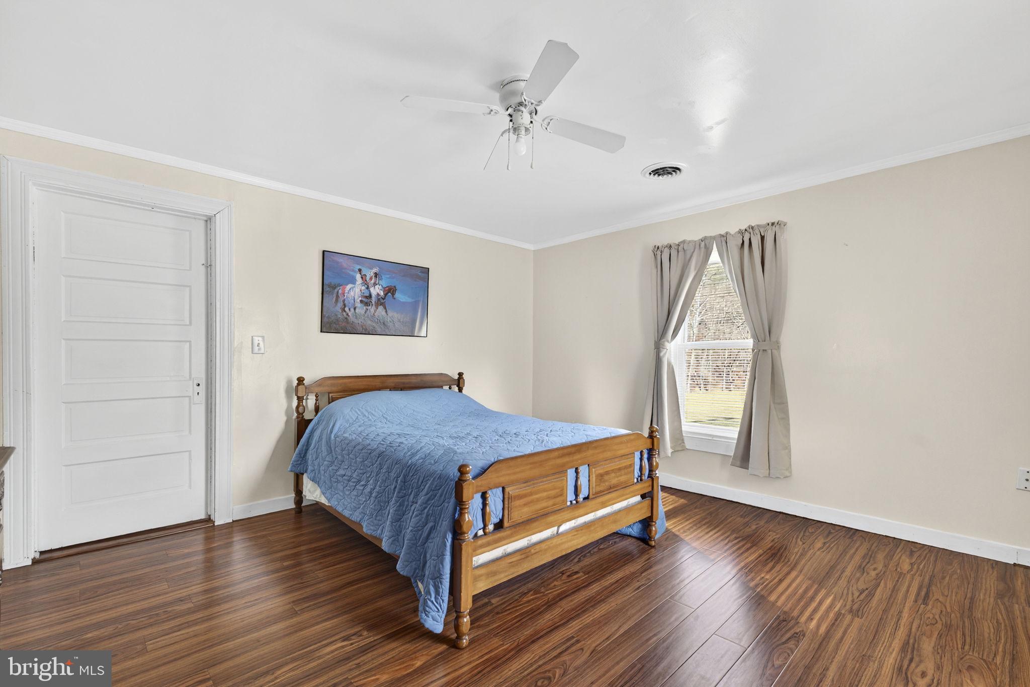 10500 Ford Hill Road Rio, WV 26755 - Photo 19 of 59 a bedroom with a bed and a window