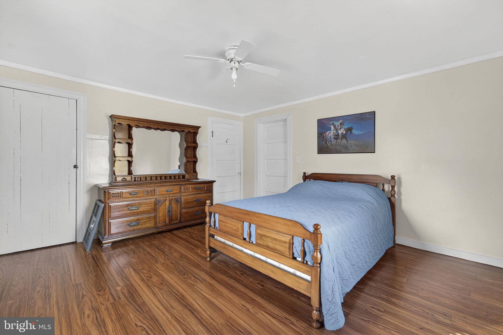 10500 Ford Hill Road Rio, WV 26755 - Photo 20 of 59 a bedroom with a bed and a dresser