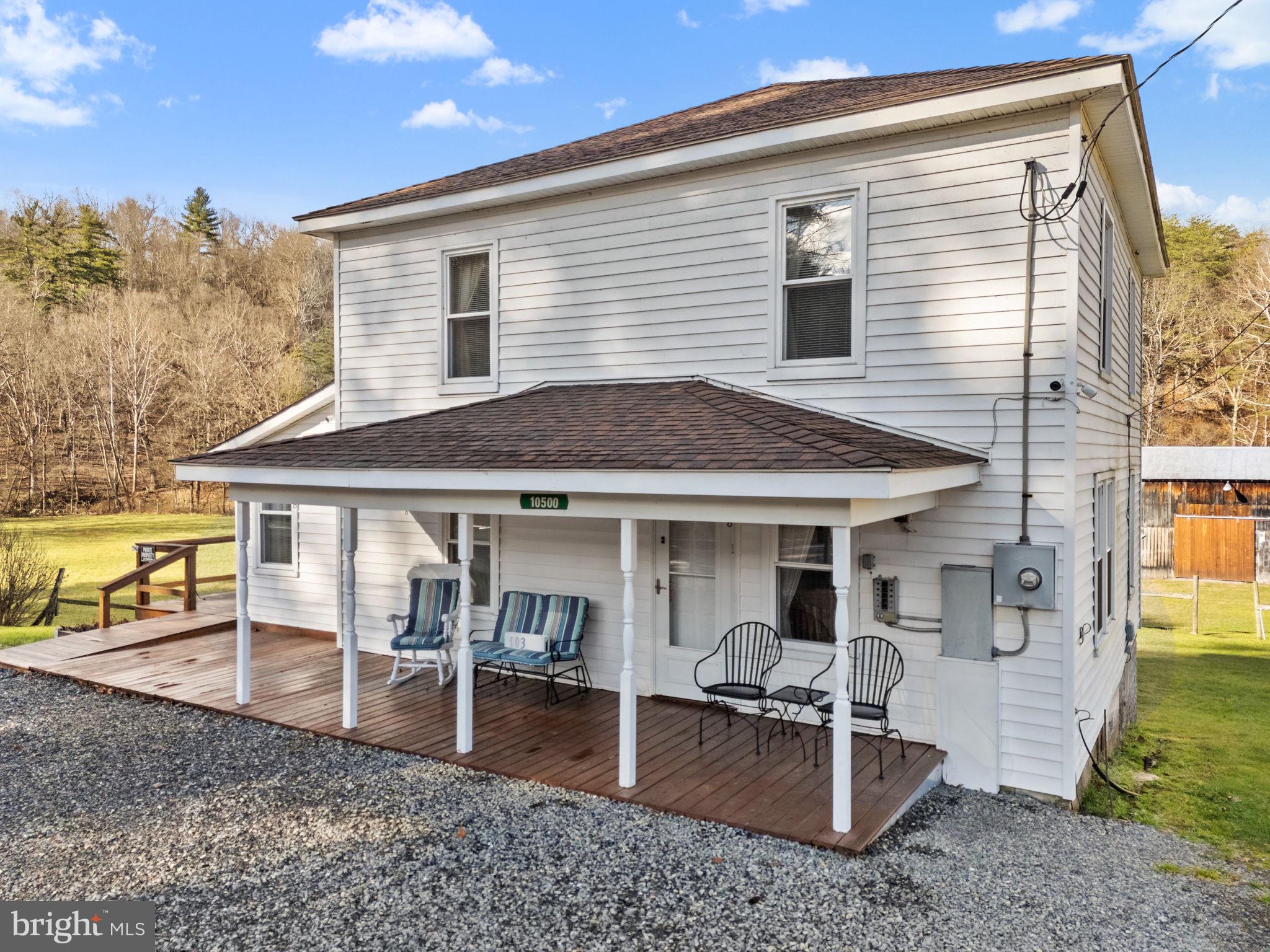 10500 Ford Hill Road Rio, WV 26755 - Photo 2 of 59 front view of a house with a patio