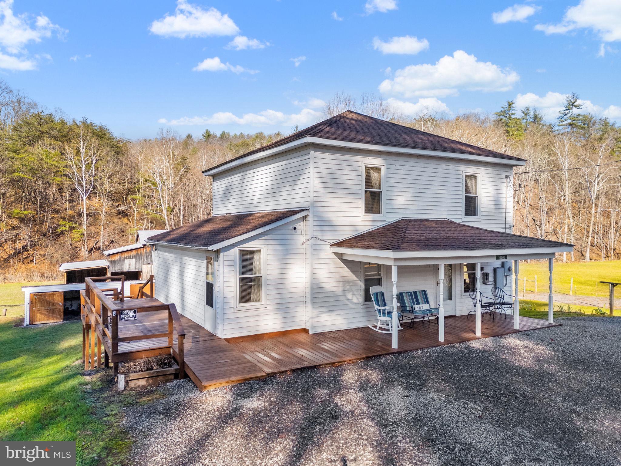 10500 Ford Hill Road Rio, WV 26755 - Photo 29 of 59 a view of a house with a yard and sitting area