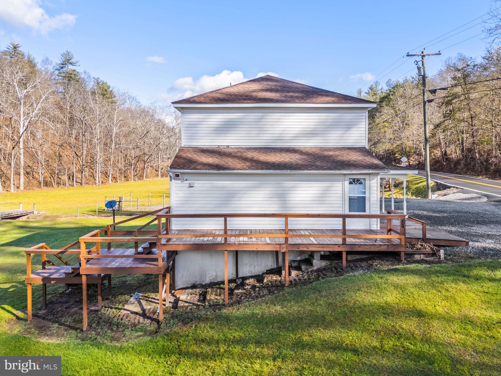 10500 Ford Hill Road Rio, WV 26755 - Photo 30 of 59 a view of a chairs and table on the terrace