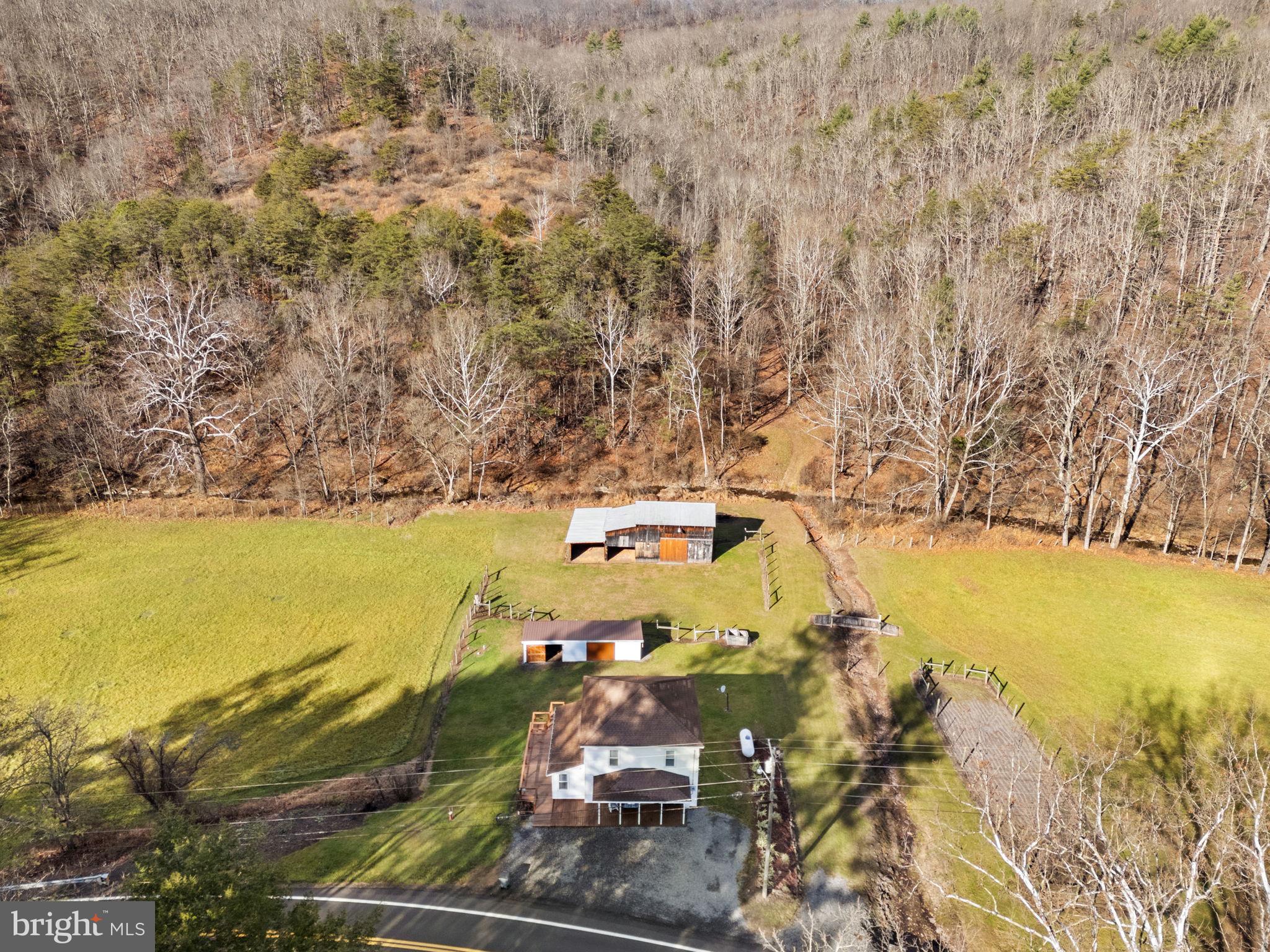 10500 Ford Hill Road Rio, WV 26755 - Photo 4 of 59 a view of an ocean with a mountain view