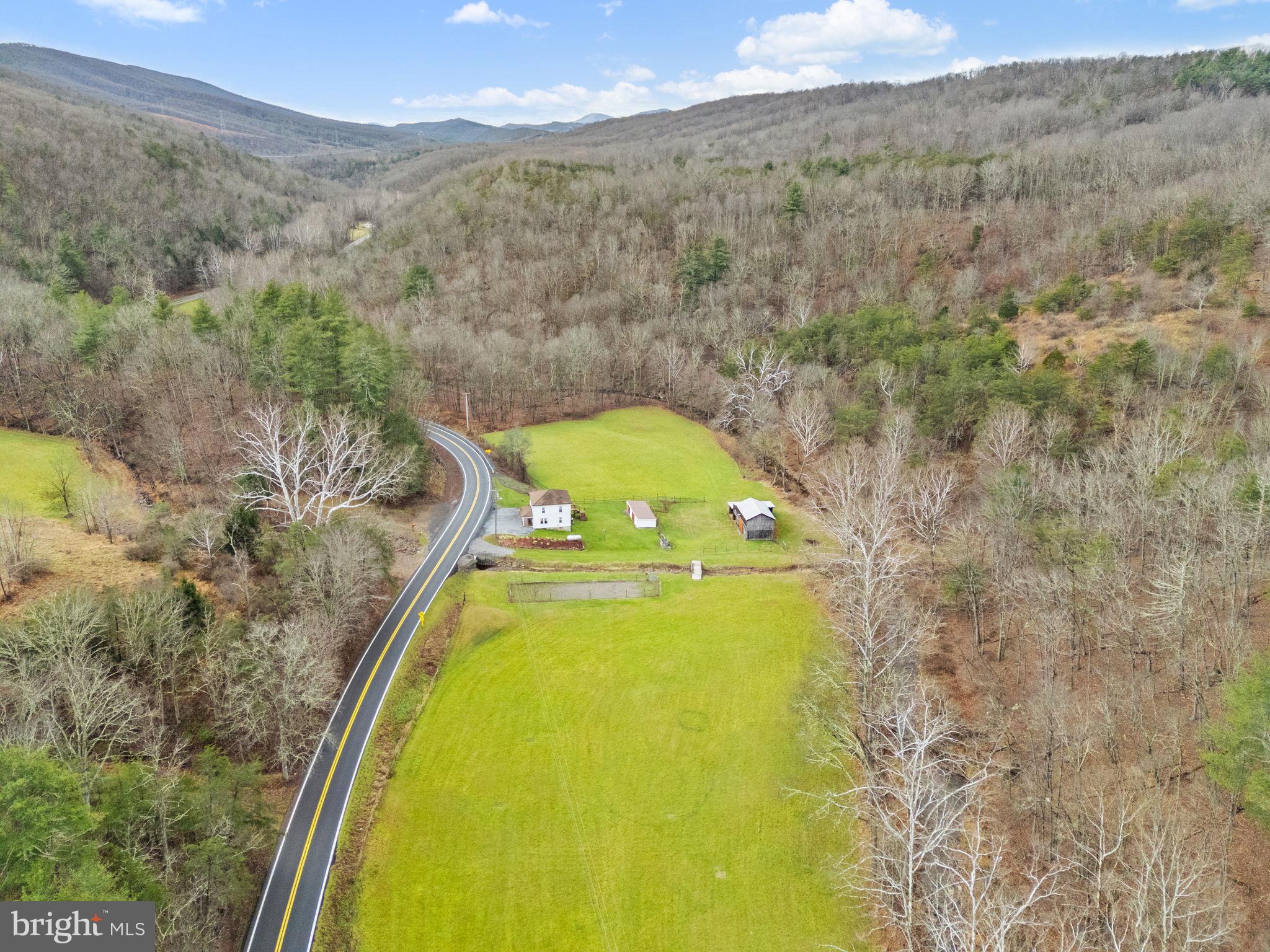 10500 Ford Hill Road Rio, WV 26755 - Photo 6 of 59 a view of a swimming pool with a yard