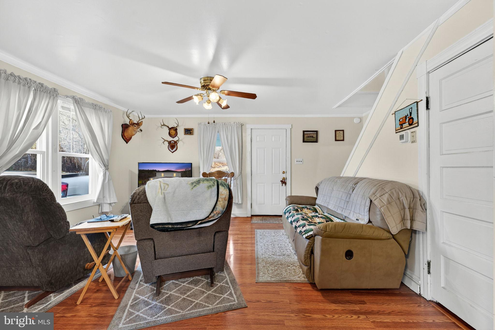 10500 Ford Hill Road Rio, WV 26755 - Photo 10 of 59 a living room with furniture and wooden floor