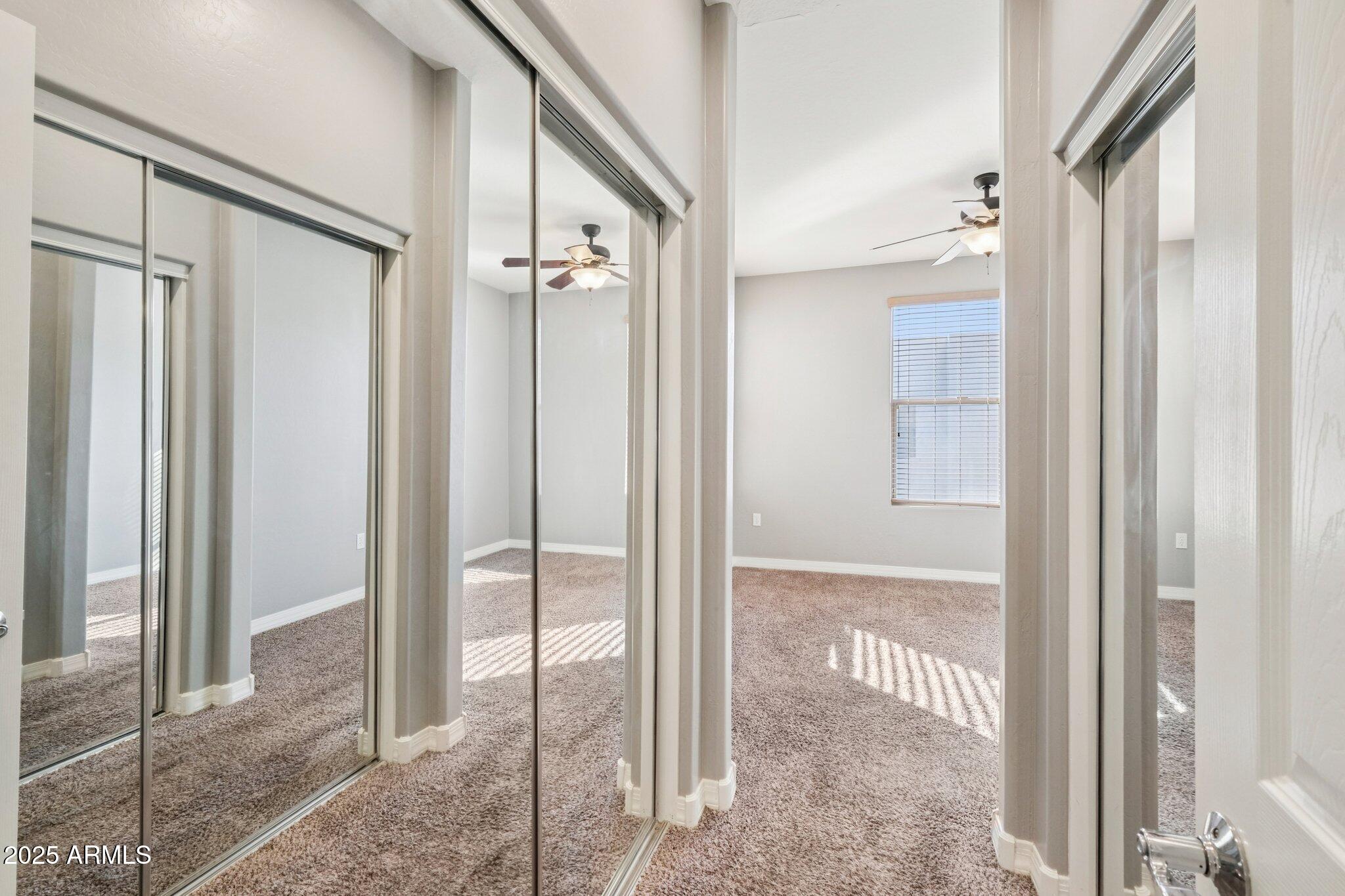 615 East Portland Street, Unit 115 Phoenix, AZ 85004 - Photo 14 of 32 a view of a bathroom from a glass door
