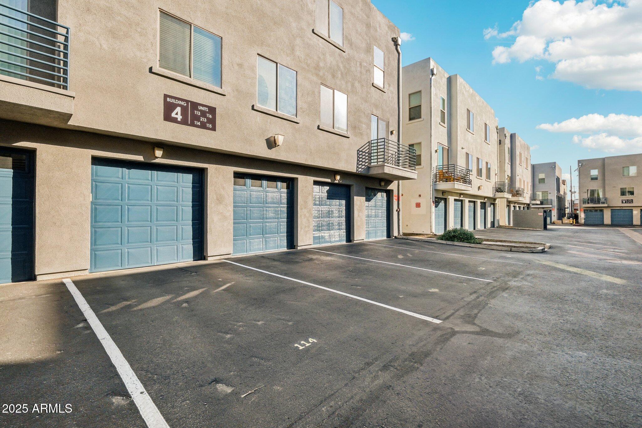 615 East Portland Street, Unit 115 Phoenix, AZ 85004 - Photo 19 of 32 a view of a building with a street