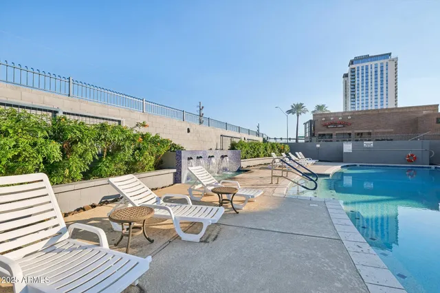a view of a living room and kitchen