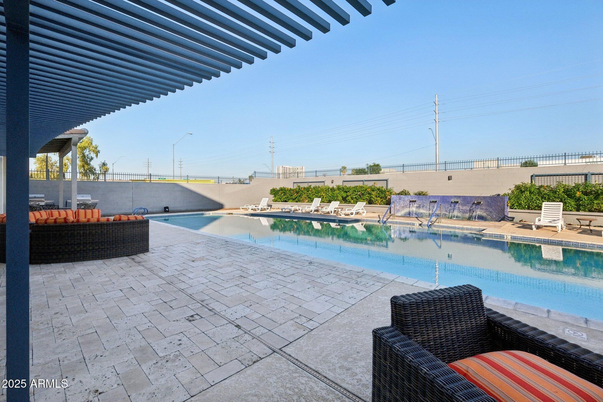 615 East Portland Street, Unit 115 Phoenix, AZ 85004 - Photo 25 of 32 a outdoor space with lots of tables and chairs