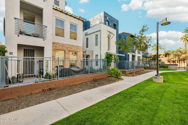 a view of a large building with garden