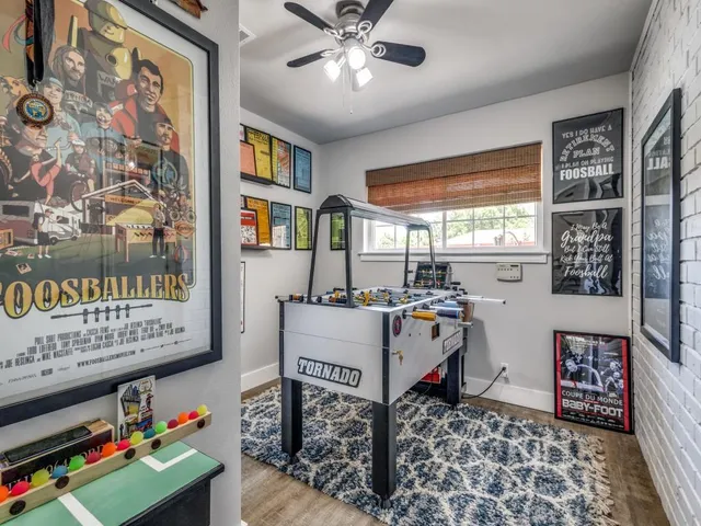a bathroom with a sink a vanity and a mirror