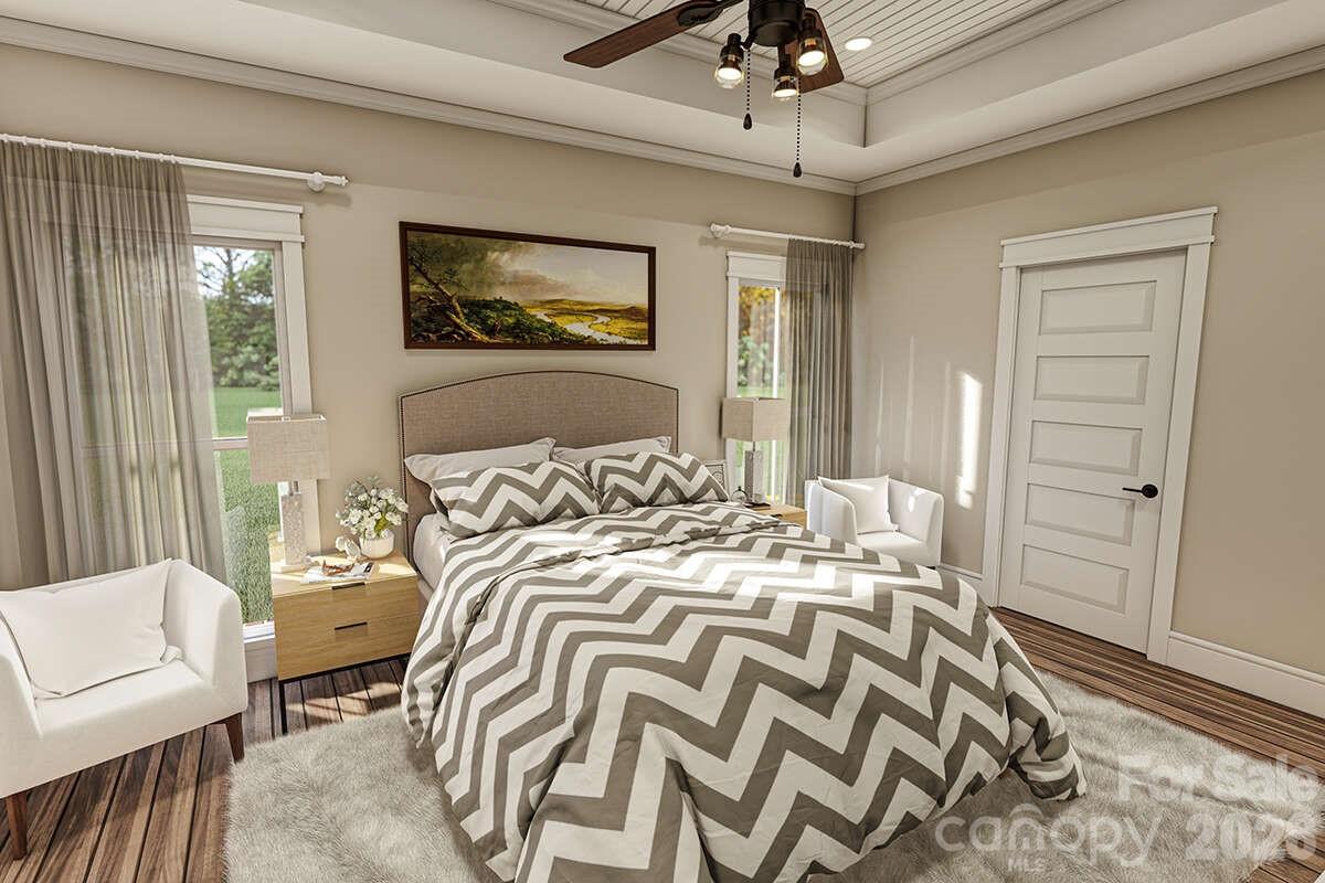 2031 Piper Ridge Drive Lenoir, NC 28645 - Photo 12 of 19 a bedroom with a bed and a chandelier