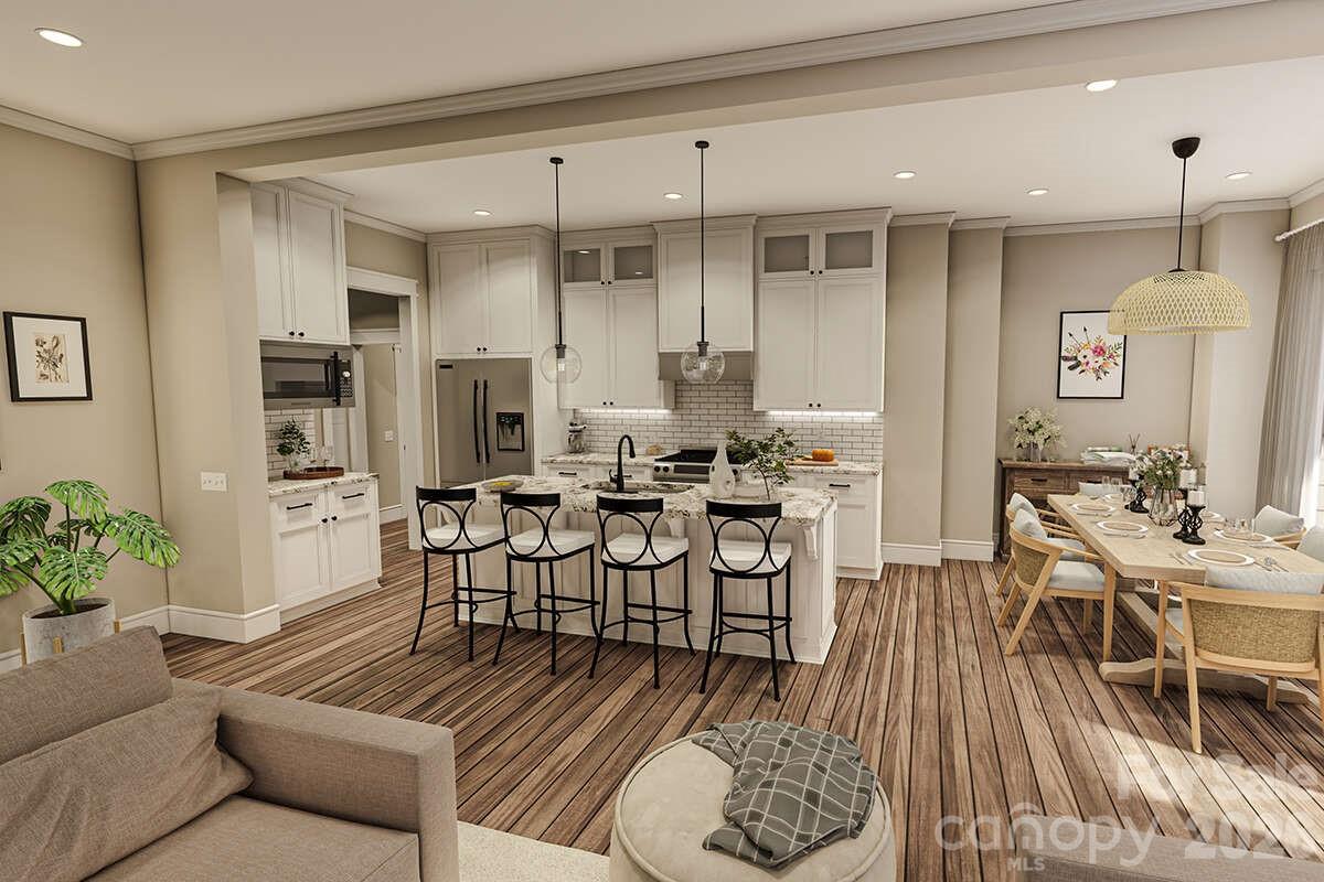 2031 Piper Ridge Drive Lenoir, NC 28645 - Photo 7 of 19 a view of a dining room with furniture and wooden floor