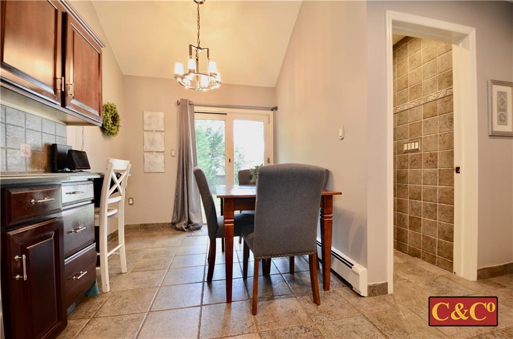 8 Oak Street Valley Stream, NY 11581 - Photo 11 of 40 a view of a dining room with furniture